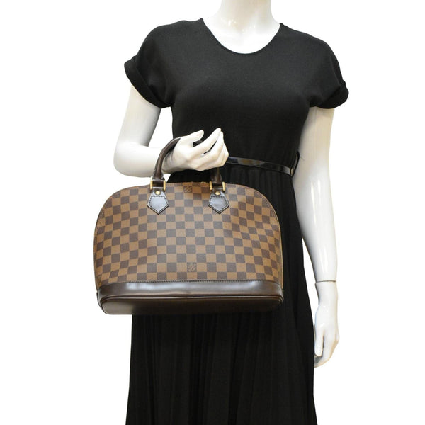 LOUIS VUITTON Alma PM Damier Ebene Satchel Bag Brown