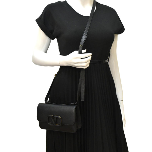VALENTINO VSling Italian Black Leather Crossbody Belt Bag with body view