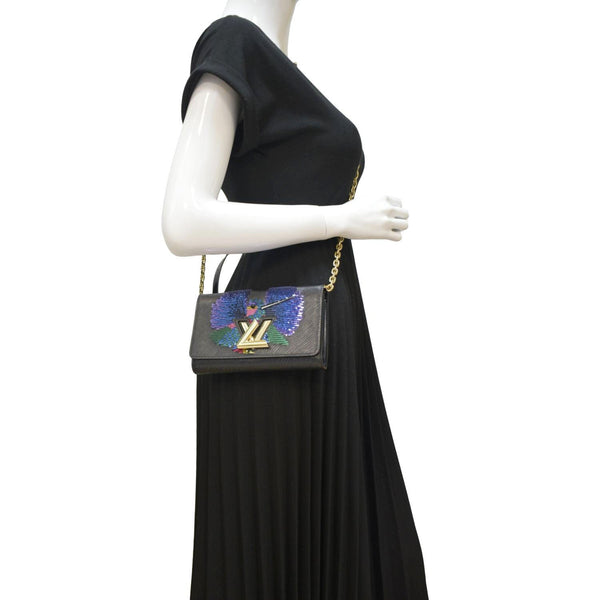 LOUIS VUITTON Twist Sequin Bird Epi Leather Chain Clutch Black