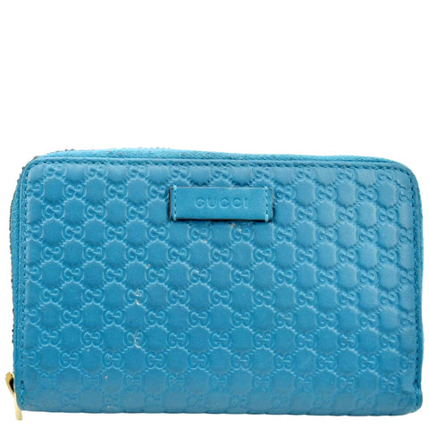 GUCCI Zip Around GG Embossed Leather Wallet Deep Cobalt
