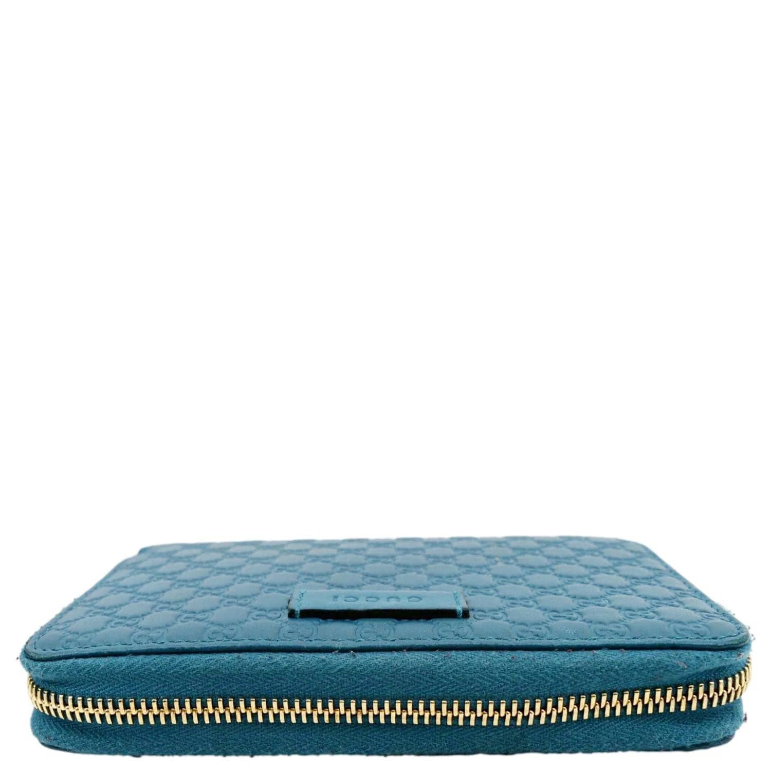 Gucci Embossed Logo Leather Wallet In Blue