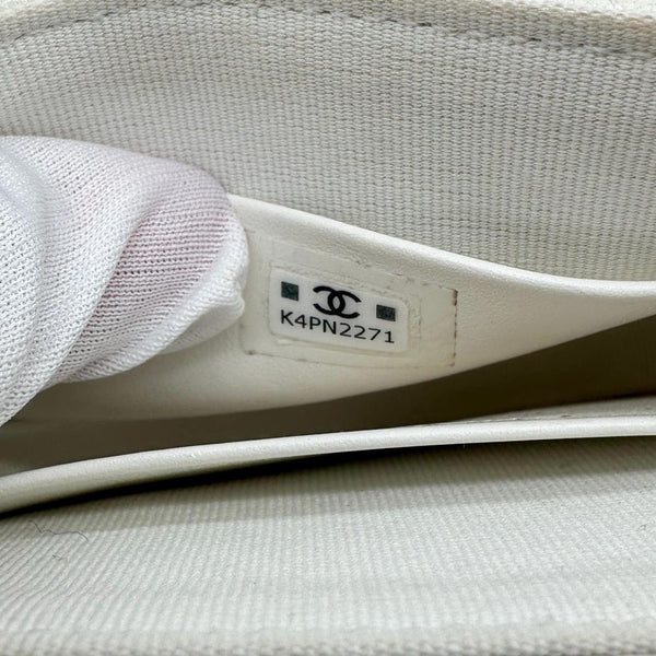 CHANEL Aged Quilted Calfskin Leather Top Handle Clutch With Chain White