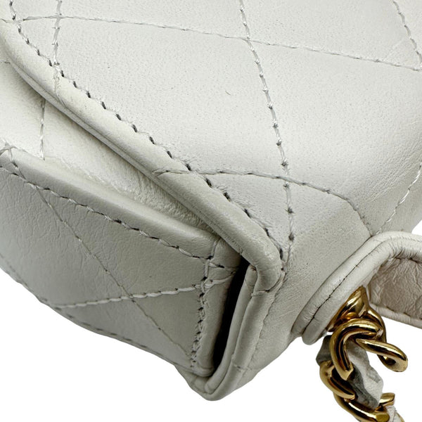 CHANEL Aged Quilted Calfskin Leather Top Handle Clutch With Chain White