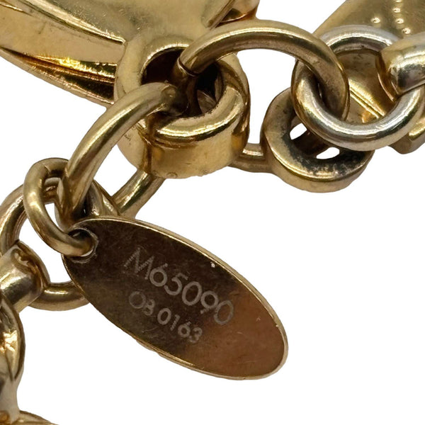 LOUIS VUITTON Tapage Meatal Key Holder Bag Charm Gold
