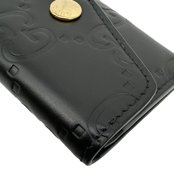 GUCCI Snap Gilbert Jumbo GG Calfskin Embossed Leather Wallet Black 772792