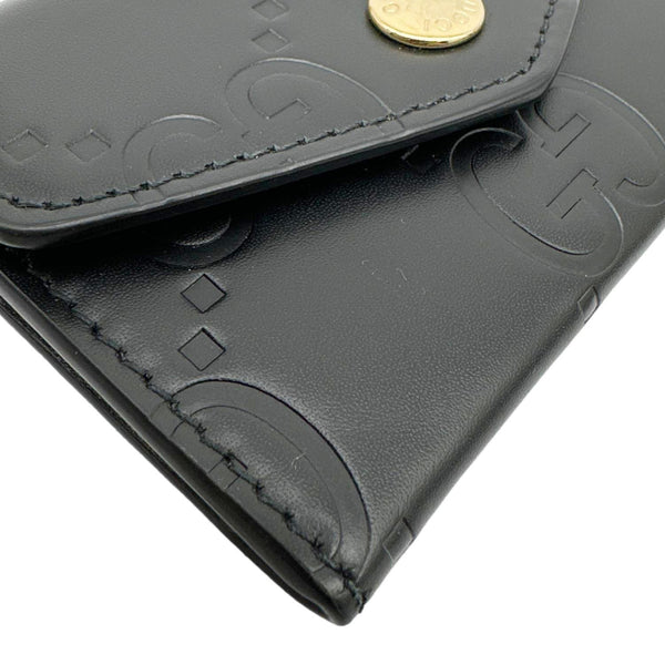 GUCCI Snap Gilbert Jumbo GG Calfskin Embossed Leather Wallet Black 772792
