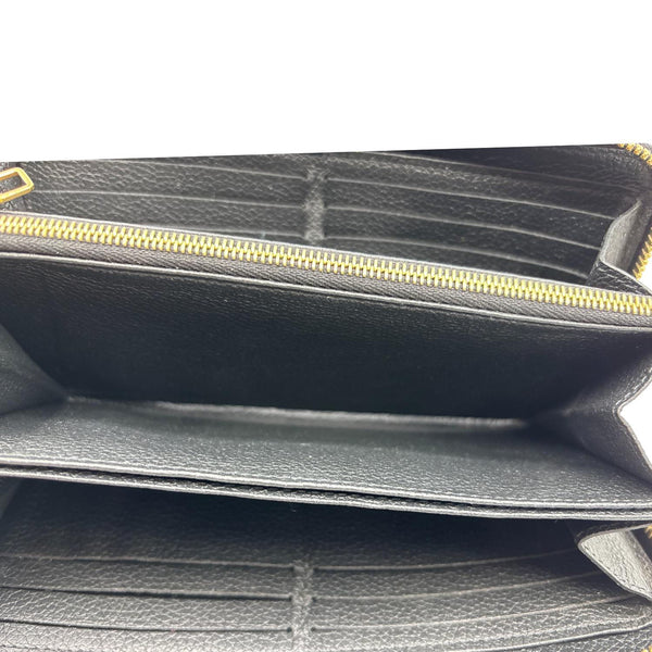 LOUIS VUITTON Monogram Empreinte Leather Zippy Wallet Bicolor