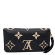 LOUIS VUITTON Monogram Empreinte Leather Zippy Wallet Bicolor