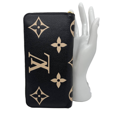 LOUIS VUITTON Monogram Empreinte Leather Zippy Wallet Bicolor