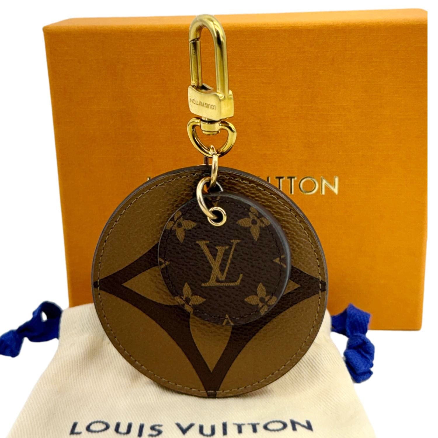 louis vuitton backpack bag charm navy monogram canvas LOUIS VUITTON Reverse Monogram Canvas Round Charm Key Holder Brown