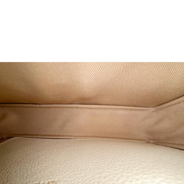 LOUIS VUITTON Metis Monogram Empreinte Leather Wallet On Chain Cream