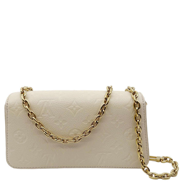 LOUIS VUITTON Metis Monogram Empreinte Leather Wallet On Chain Cream
