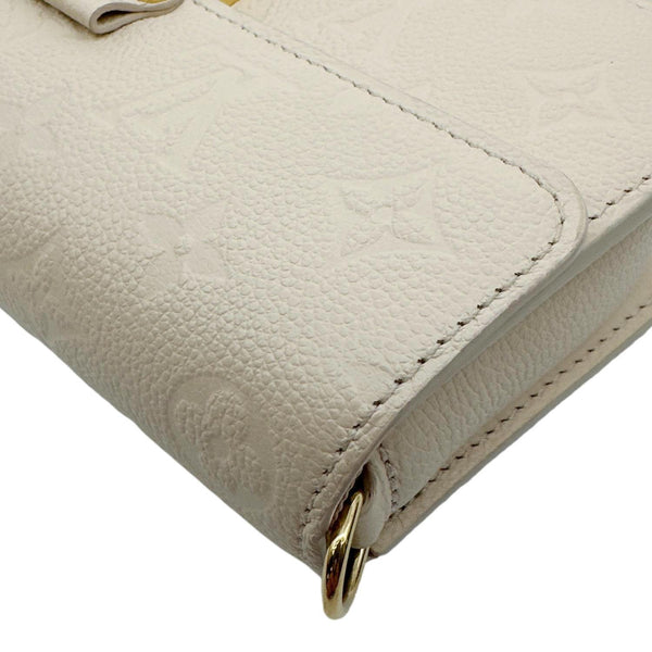 LOUIS VUITTON Metis Monogram Empreinte Leather Wallet On Chain Cream