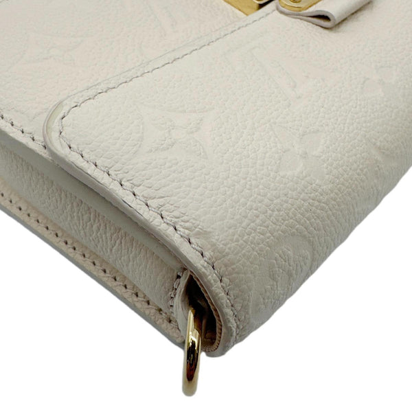 LOUIS VUITTON Metis Monogram Empreinte Leather Wallet On Chain Cream