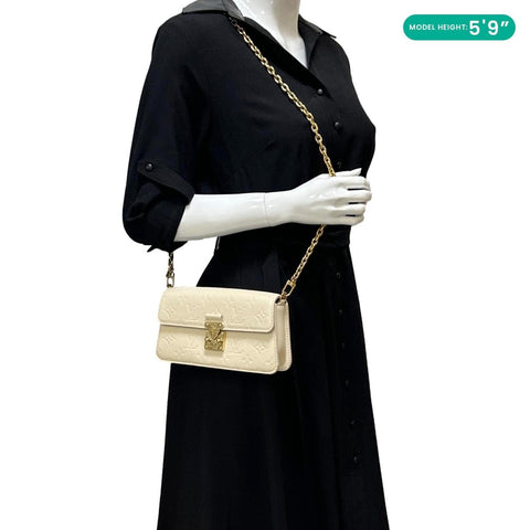 LOUIS VUITTON Metis Monogram Empreinte Leather Wallet On Chain Cream