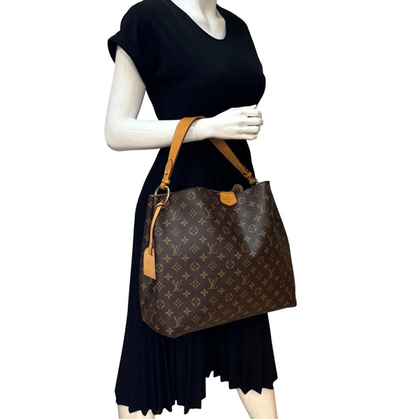LOUIS VUITTON Graceful MM Brown Monogram Canvas Shoulder Bag - Model Holding