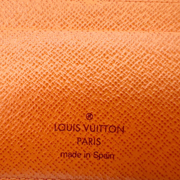 LOUIS VUITTON Insolite Monogram Multicolor Zippy Wallet White