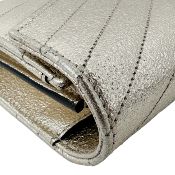 YVES SAINT LAURENT Cassandre Metallic Grain De Poudre Leather Shoulder Bag Silver