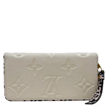 LOUIS VUITTON Zippy Grained Monogram Empreinte Leather Wallet Beige