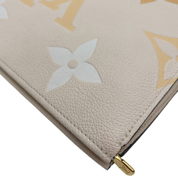 LOUIS VUITTON Toiletry Pouch By The Pool Monogram Giant Empreinte Leather Clutch Peach