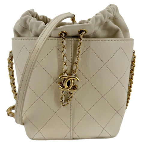CHANEL CC Drawstring Quilted Leather Crossbody Bucket Bag Cream
