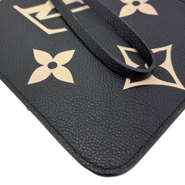 LOUIS VUITTON Monogram Empreinte Leather Bicolor Wristlet Black