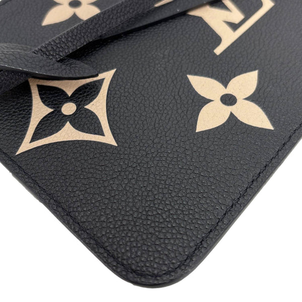 LOUIS VUITTON Monogram Empreinte Leather Bicolor Wristlet Black