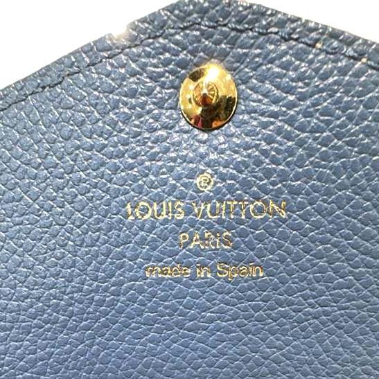 LOUIS VUITTON Sarah Monogram Empreinte Leather Wallet Beige