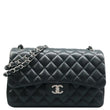 CHANEL Jumbo Classic Double Flap Shoulder Bag Black front look