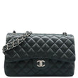 CHANEL Jumbo Classic Double Flap Shoulder Bag Black front look