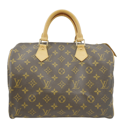 Download A pink Louis Vuitton purse adding a pop of color to an