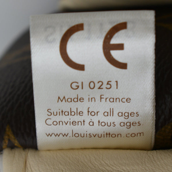 LOUIS VUITTON Doudou Oscar Dog Monogram Toy Beige