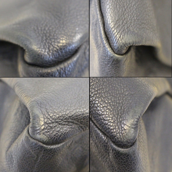 Louis Vuitton Artsy MM Empreinte Monogram Shoulder Bag leather