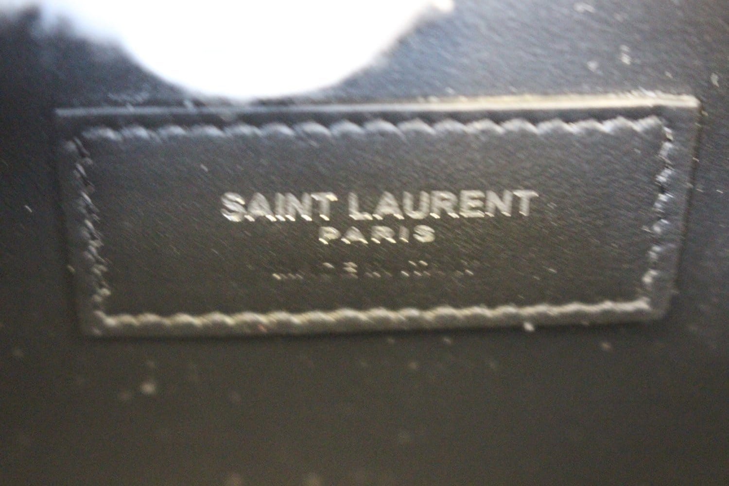 Saint Laurent bag real vs fake. How to spot counterfeit YSL Kate Monogram  handbag 