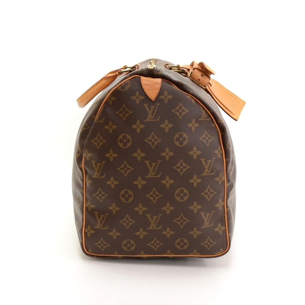 LOUIS VUITTON. Keepall bag in monogram canvas and natura…