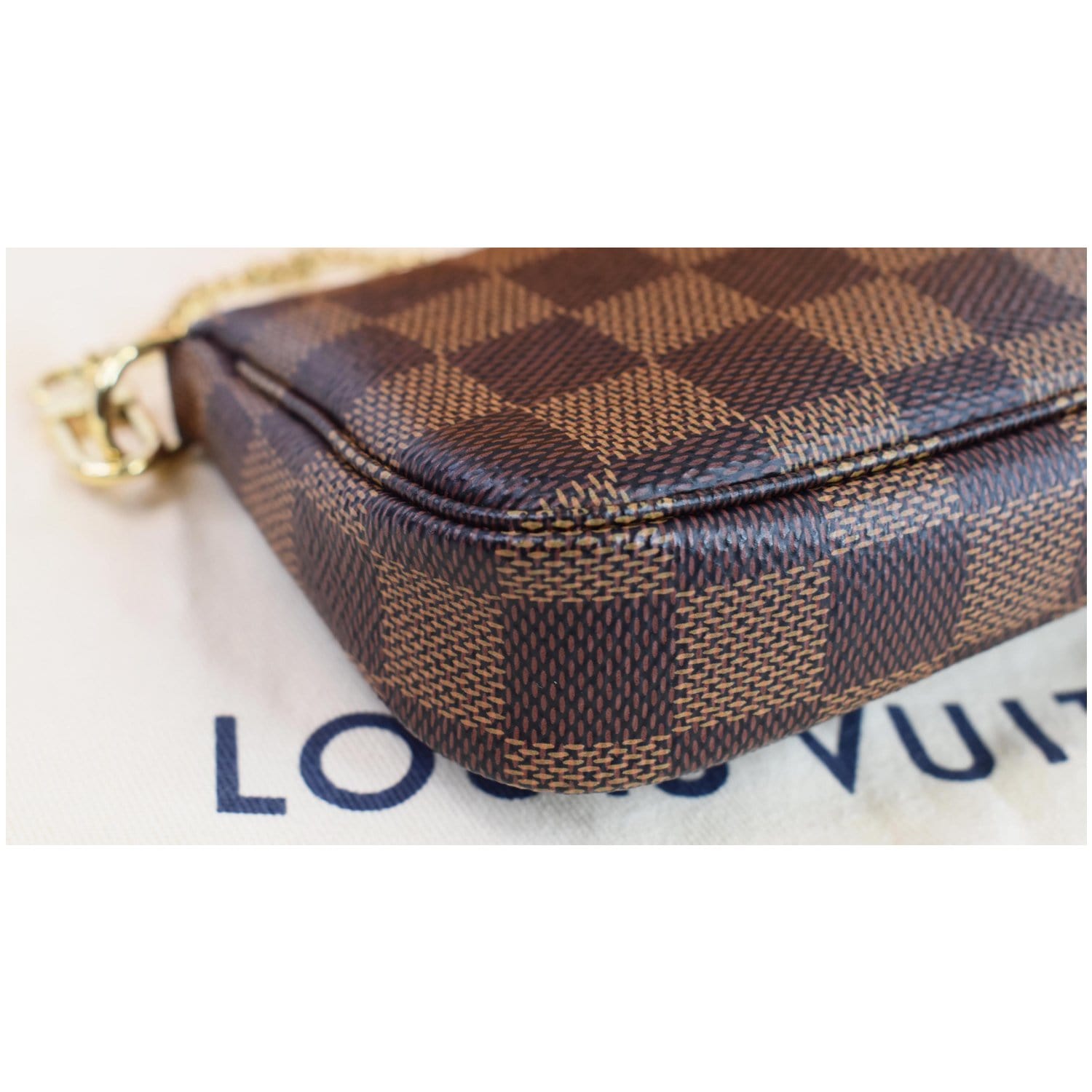 Louis Vuitton mini pochette damier ebene