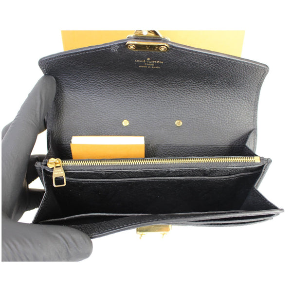 Louis Vuitton Metis Monogram Empreinte Leather Pouch - internal pockets