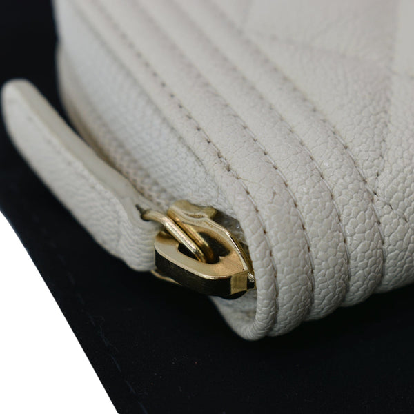 CHANEL Caviar Quilted Small Boy Zip Around Wallet White
