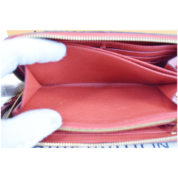LOUIS VUITTON Monogram Empreinte Leather Zippy Wallet Red