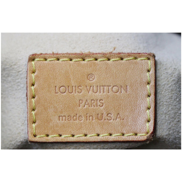 Engraved Louis Vuitton Artsy MM handbag
