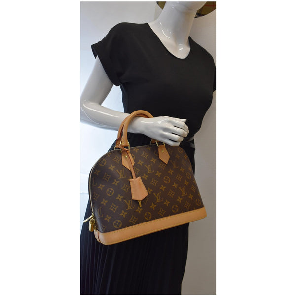 LOUIS VUITTON Alma PM Monogram Canvas Satchel Bag Brown