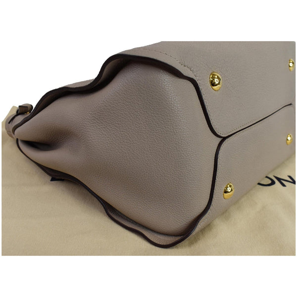 Louis Vuitton Tournon Taurillon Leather Hobo Bag Galet - gold buttons