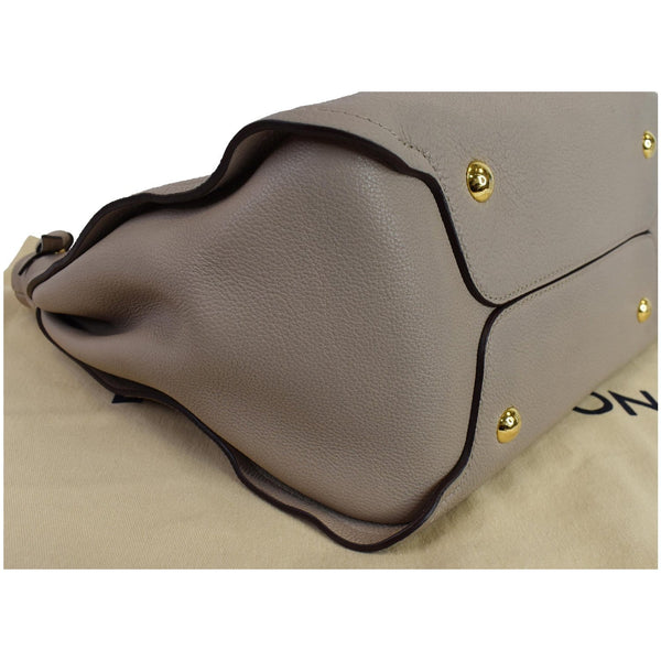 Louis Vuitton Tournon Taurillon Leather Hobo Bag Galet - gold buttons