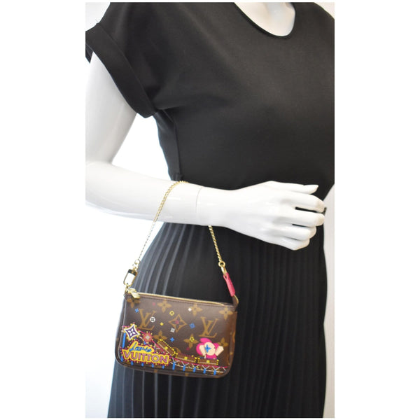 LOUIS VUITTON Mini Pochette Christmas Monogram Canvas Accessoires Pouch Brown