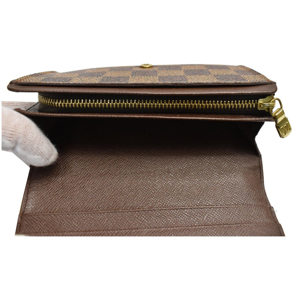 Louis Vuitton Porte Monnaie wallet for women inside