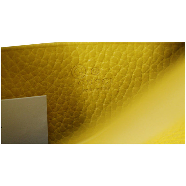 GUCCI GG Interlocking Pebbled Leather Crossbody Bag Yellow 615523