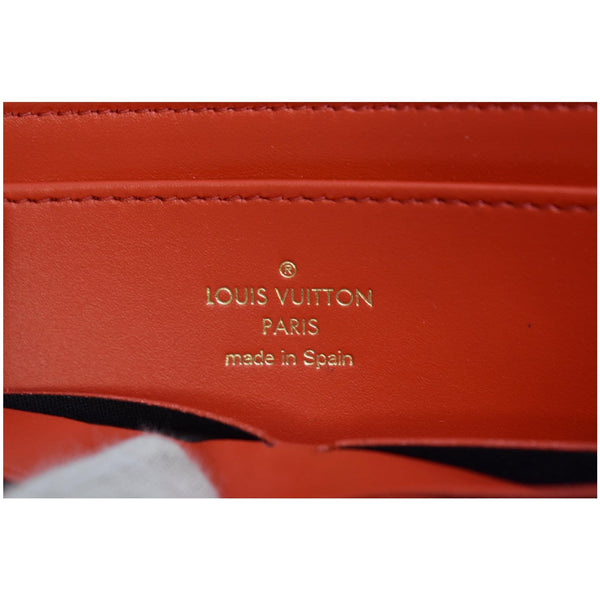 LOUIS VUITTON Flower Lock Monogram Canvas Wallet Red