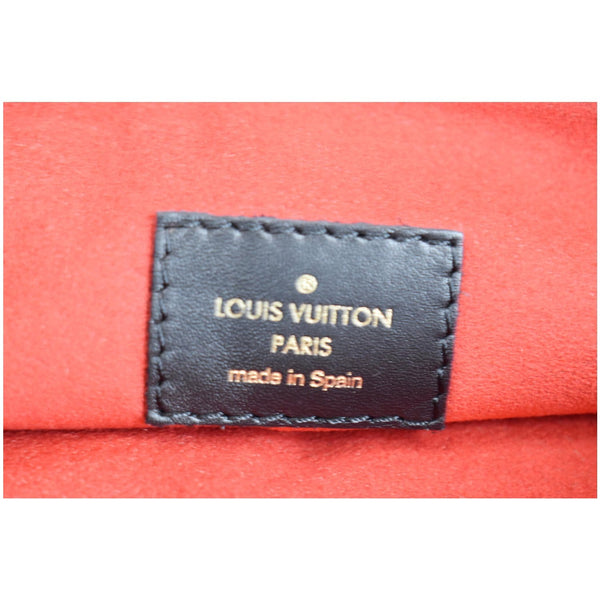 LOUIS VUITTON Tuileries Monogram Canvas Clutch Bag Caramel