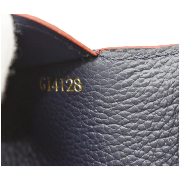 Louis Vuitton Multicartes Monogram Leather Wallet.