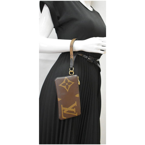 LOUIS VUITTON Trio Rectangle Giant Monogram Reverse Wristlet Pouch Brown